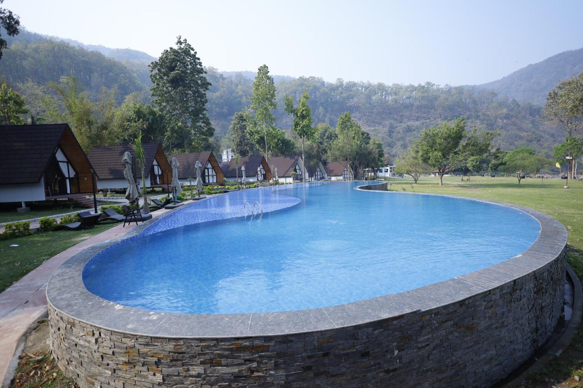 Welcomheritage Tarangi Ramganga Resort Marchula Bagian luar foto